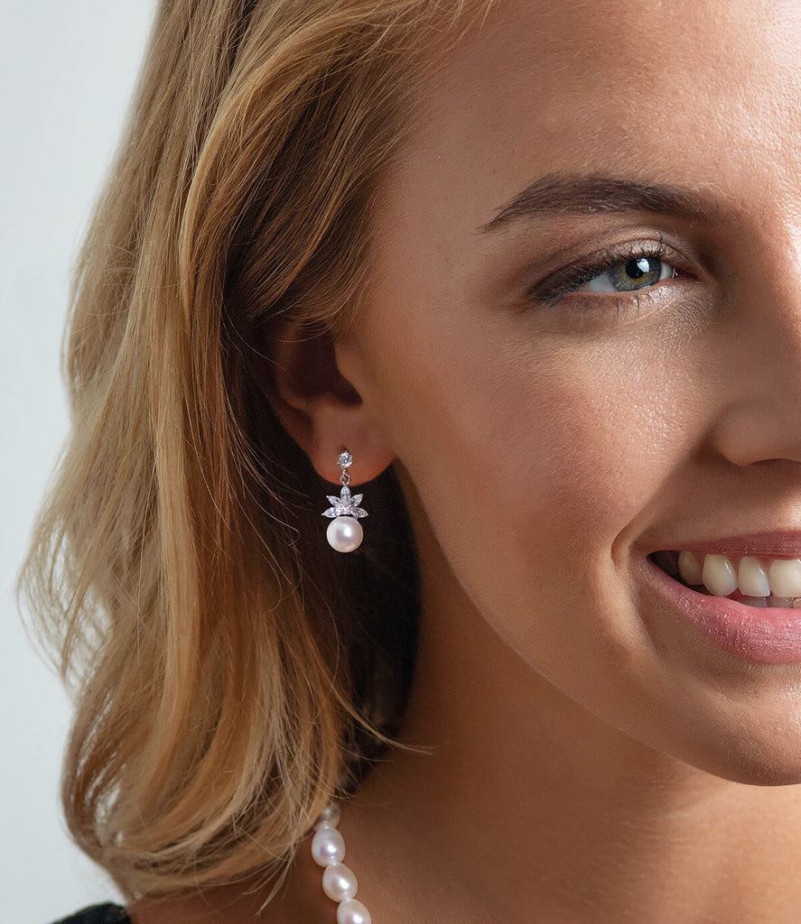Lotus on sale pearl earrings